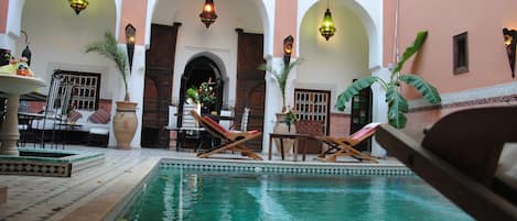 Outdoor pool, sun loungers