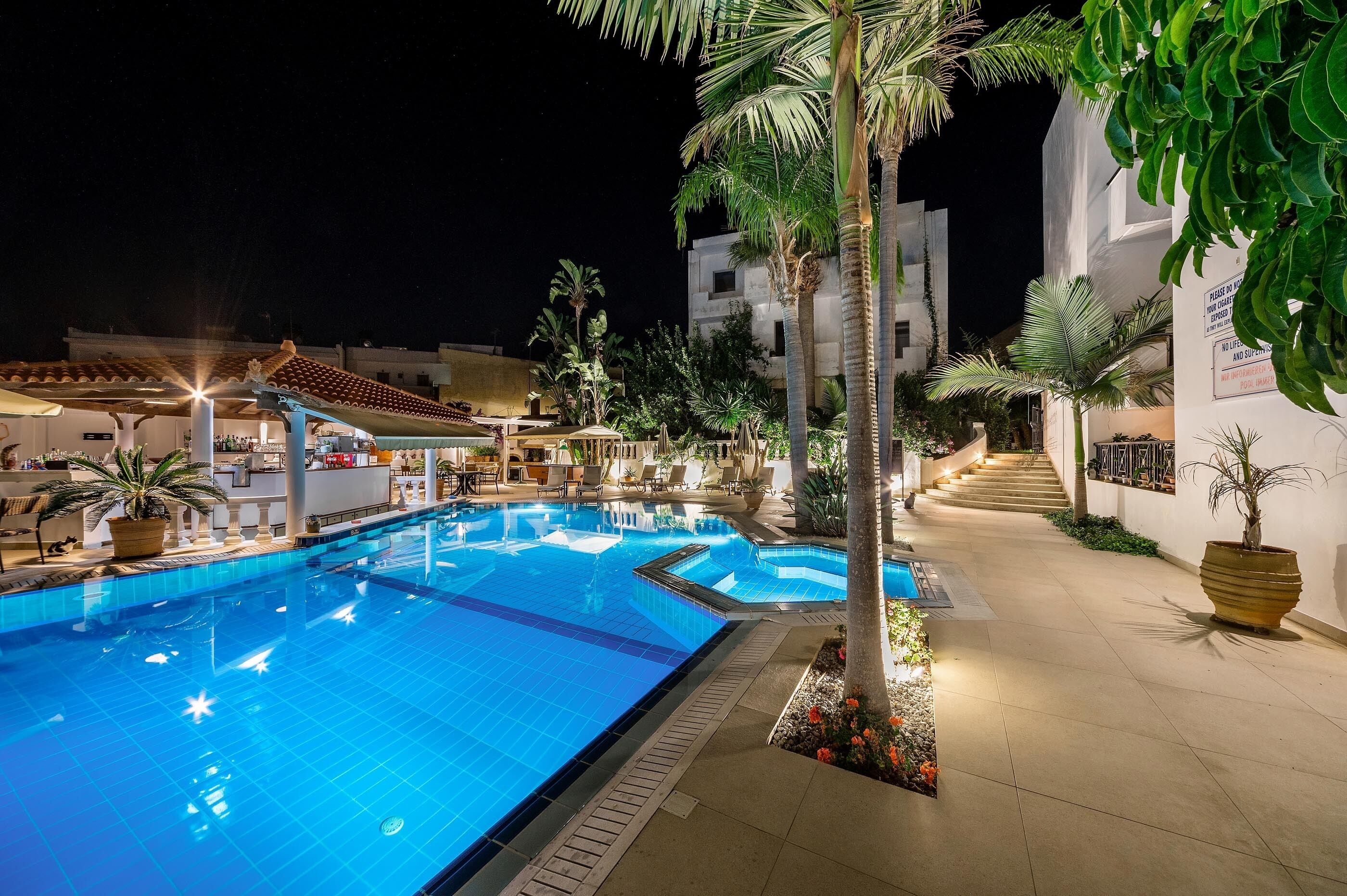 outdoor pool, pool umbrellas, pool loungers