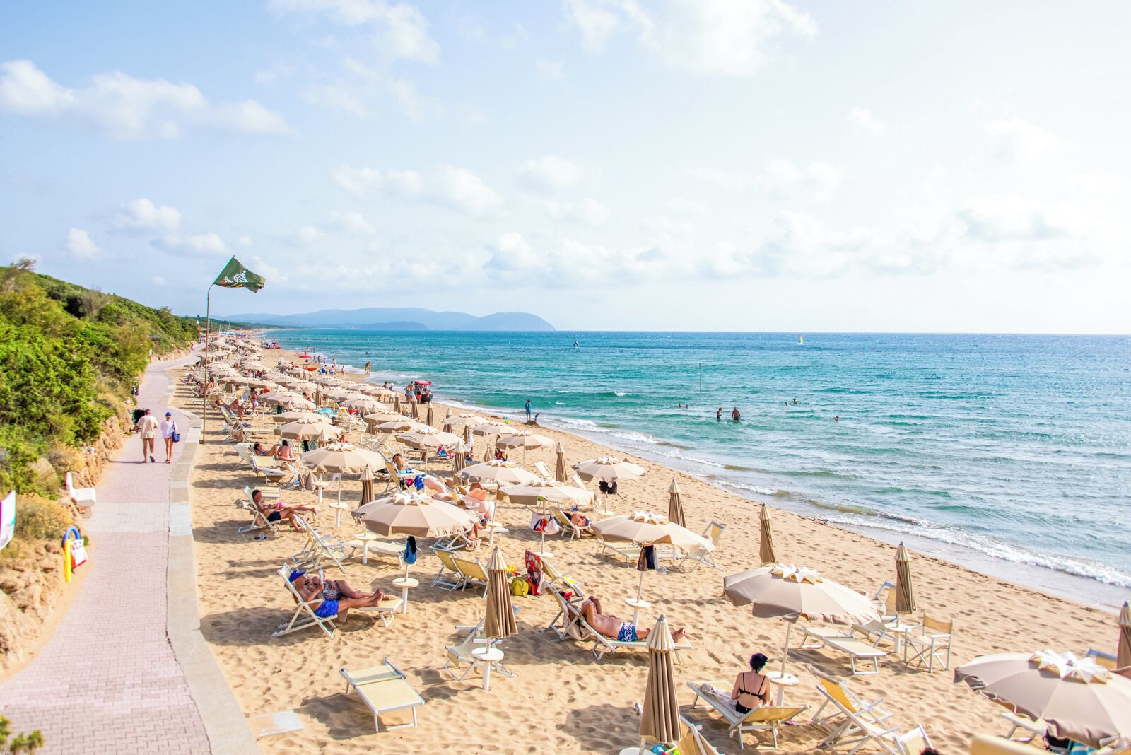 private beach, sun-loungers, beach umbrellas, beach towels