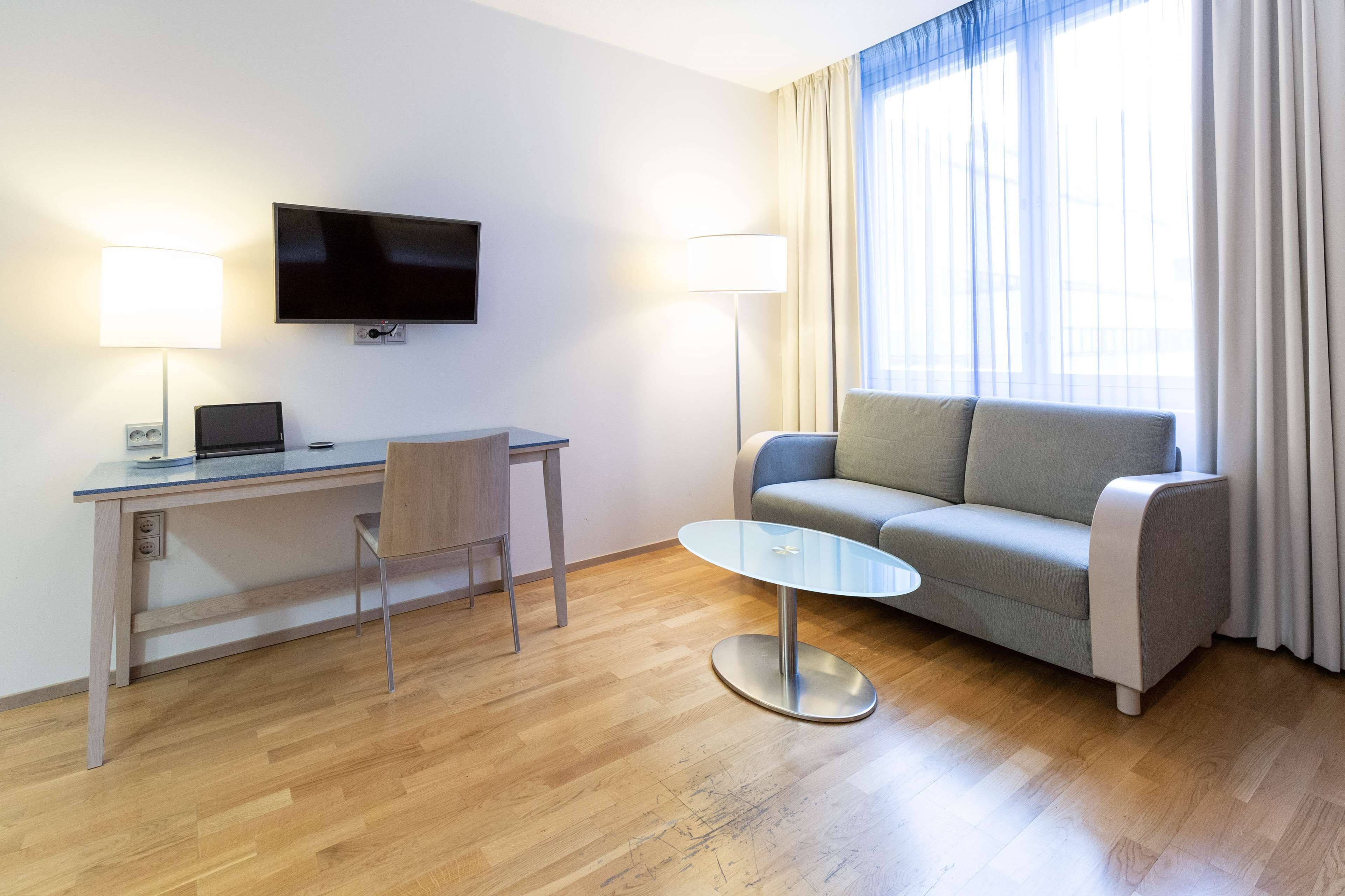 Family Room (Four | Superior) | In-room safe, desk, blackout drapes, bed sheets