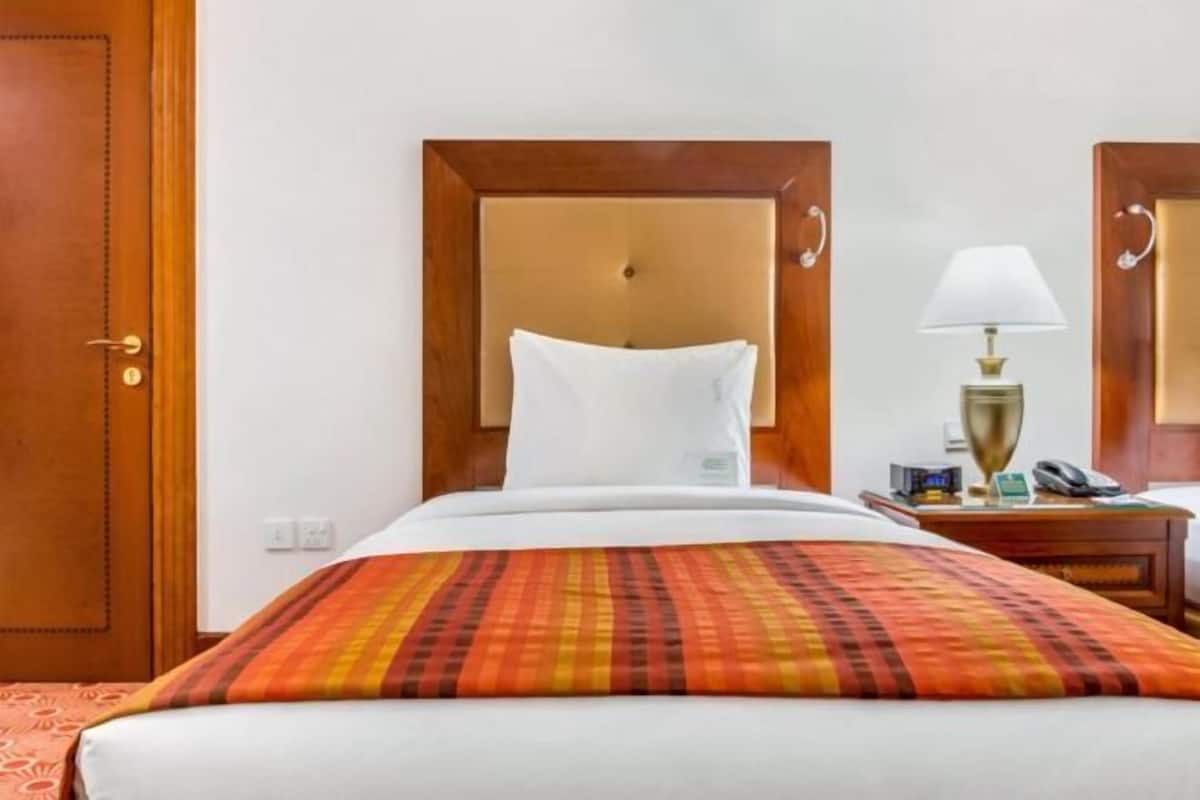 1 habitación, ropa de cama de alta calidad, cubrecamas y minibar