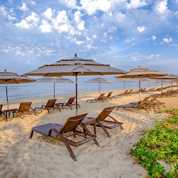 On the beach, white sand, free beach shuttle, beach cabanas