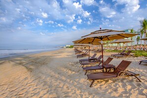 On the beach, white sand, free beach shuttle, beach cabanas