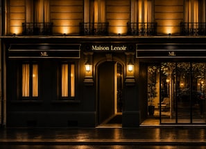 Front of property - evening/night - Hotel Maison Lenoir (Paris)