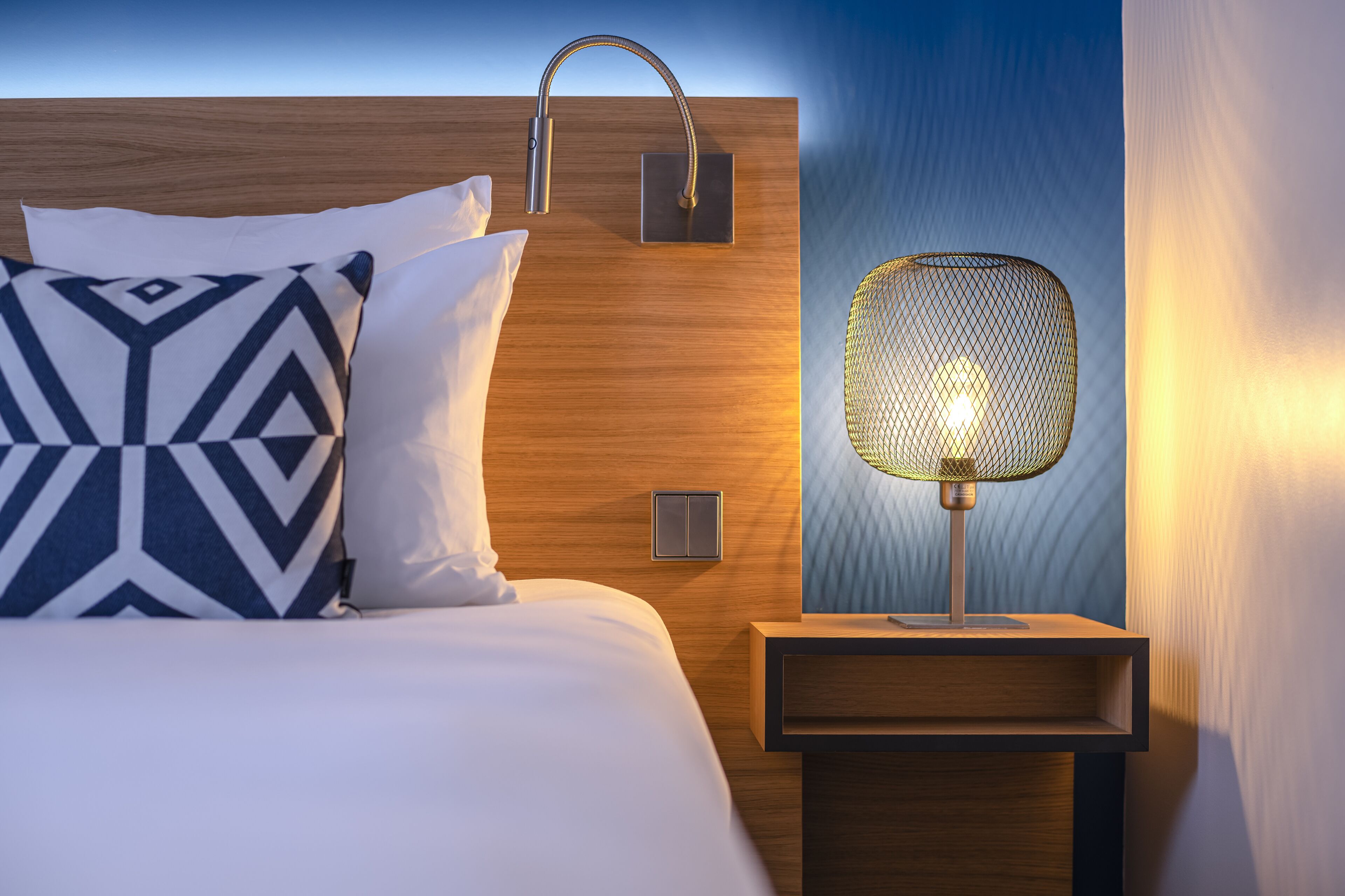 luxury room | premium bedding, desk, blackout curtains, soundproofing