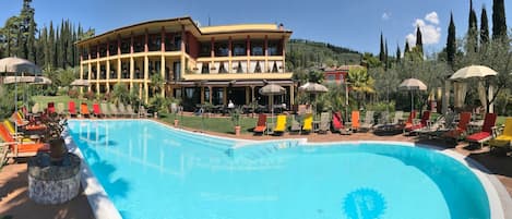 Outdoor pool, open 8 AM to 7 PM, sun loungers