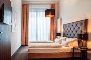 Hypo-allergenic bedding, in-room safe, soundproofing