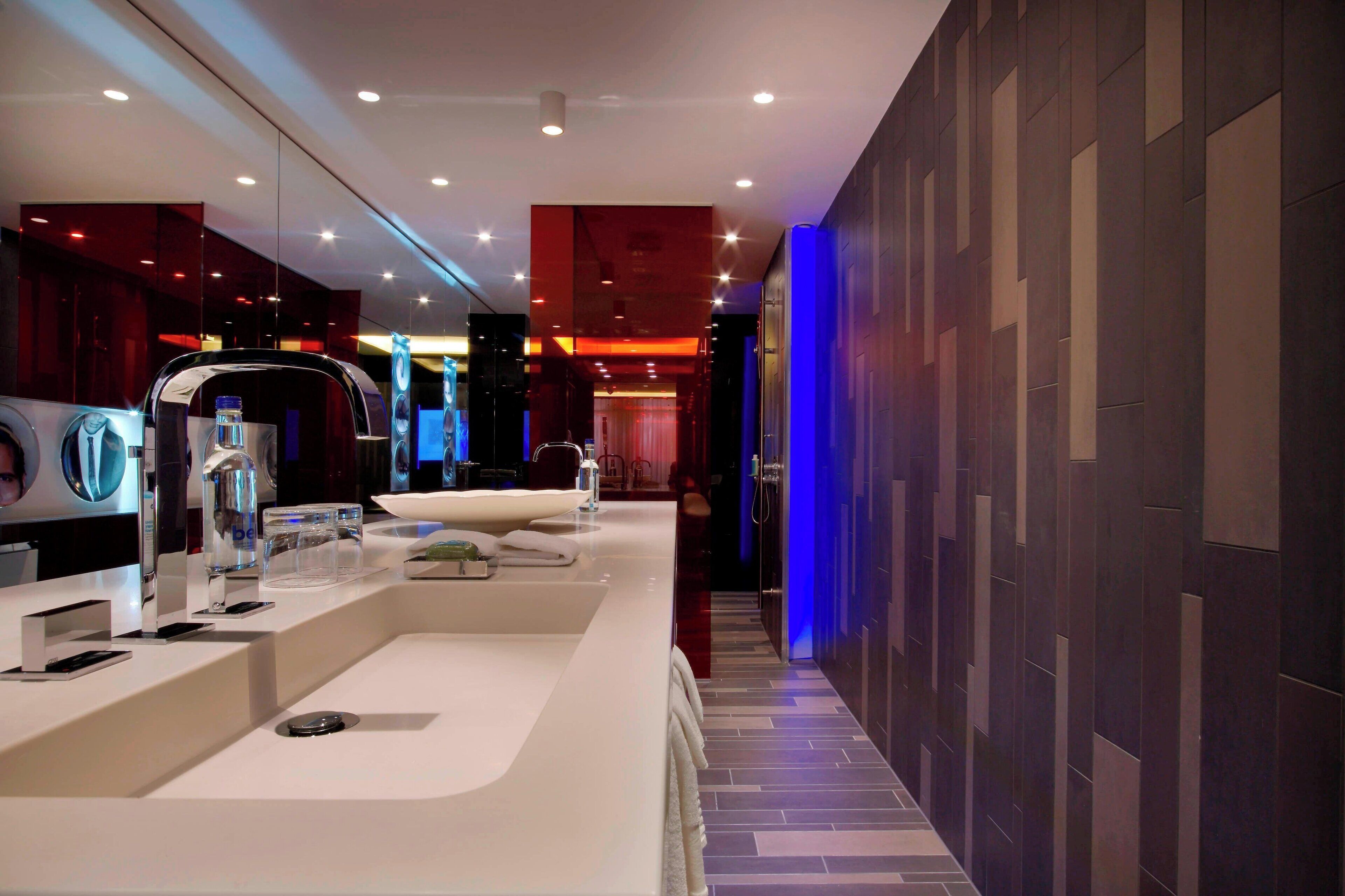 suite, 1 king bed, non smoking, corner | bathroom | free toiletries, hair dryer, bathrobes, slippers