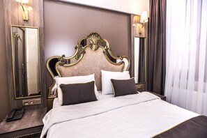 Ropa de cama de alta calidad y minibar 