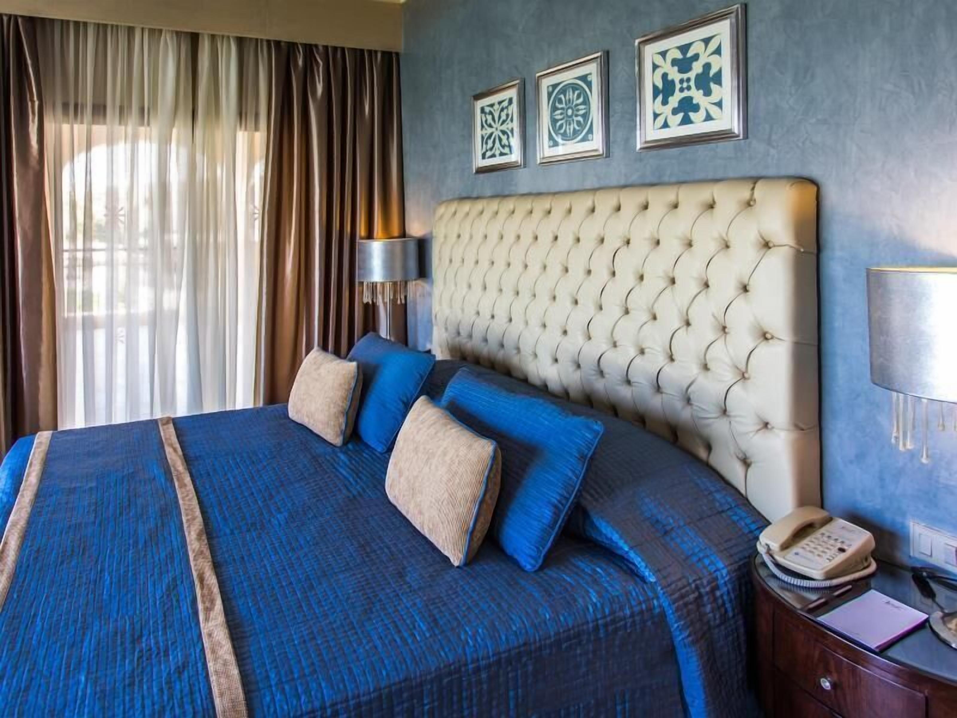 Minibar, in-room safe, blackout curtains, free rollaway beds