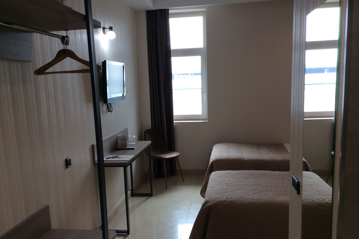 Desk, rollaway beds (surcharge), WiFi (free), bed sheets