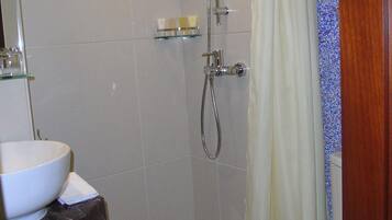 Shower, hydromassage showerhead, towels