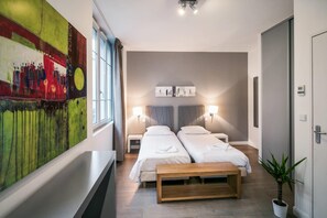 Premium bedding, minibar, blackout drapes, soundproofing