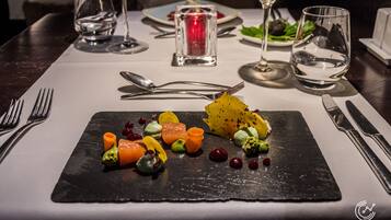 Lunch, dinner served; French cuisine, garden views