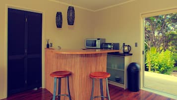 Microwave, stovetop, coffee/tea maker, electric kettle