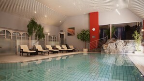 An indoor swimming pool with tiled flooring, lounge chairs, and a rock feature. - Hotel International (Clervaux)