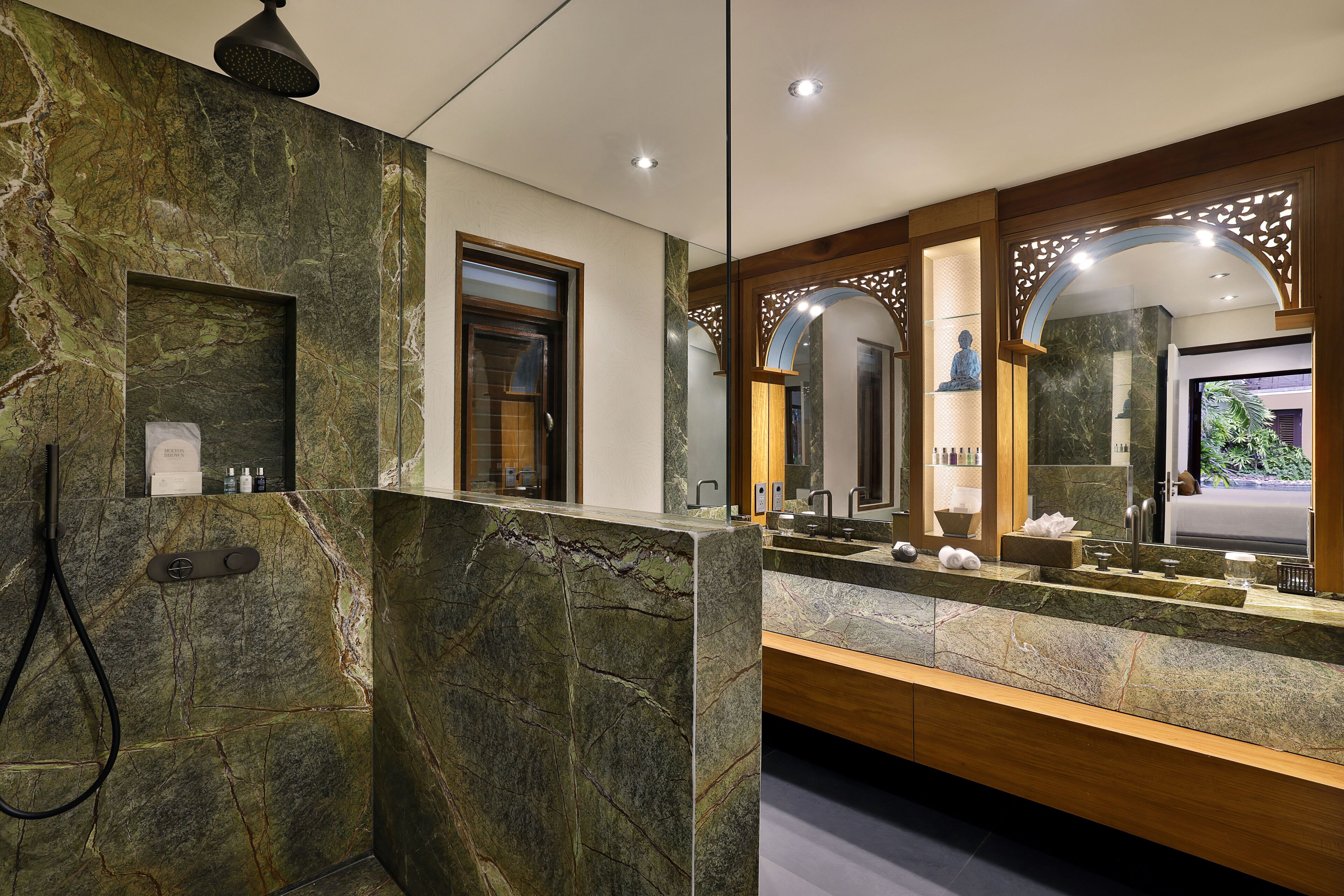 tropical pool villa | bathroom | separate bathtub and shower, rainfall showerhead, designer toiletries