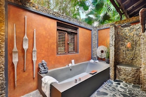 Banyan Tree Room | Bathroom | Separate tub and shower, rainfall showerhead, designer toiletries