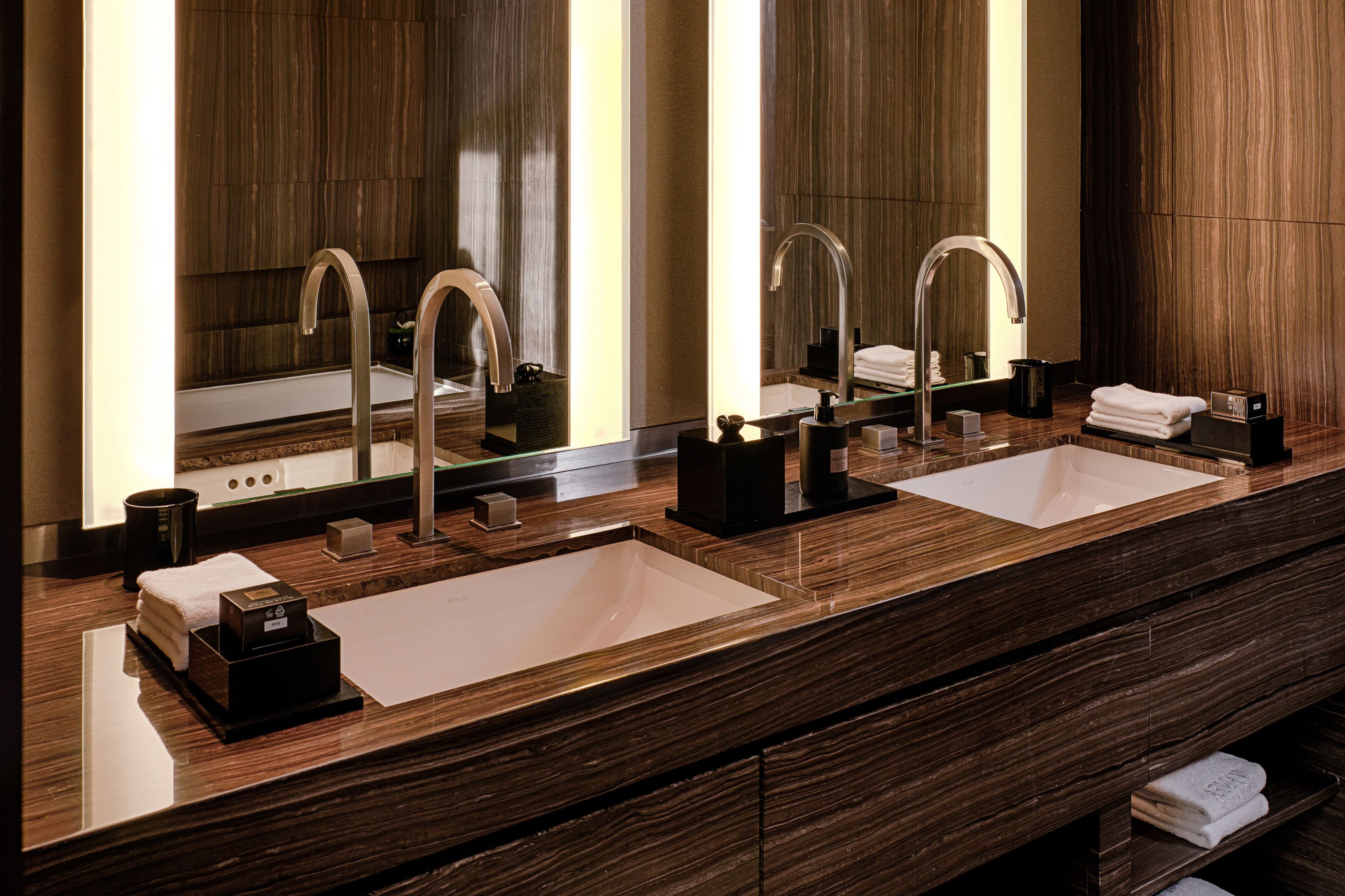 armani premiere suite | bathroom | separate bathtub and shower, designer toiletries, hair dryer, bathrobes