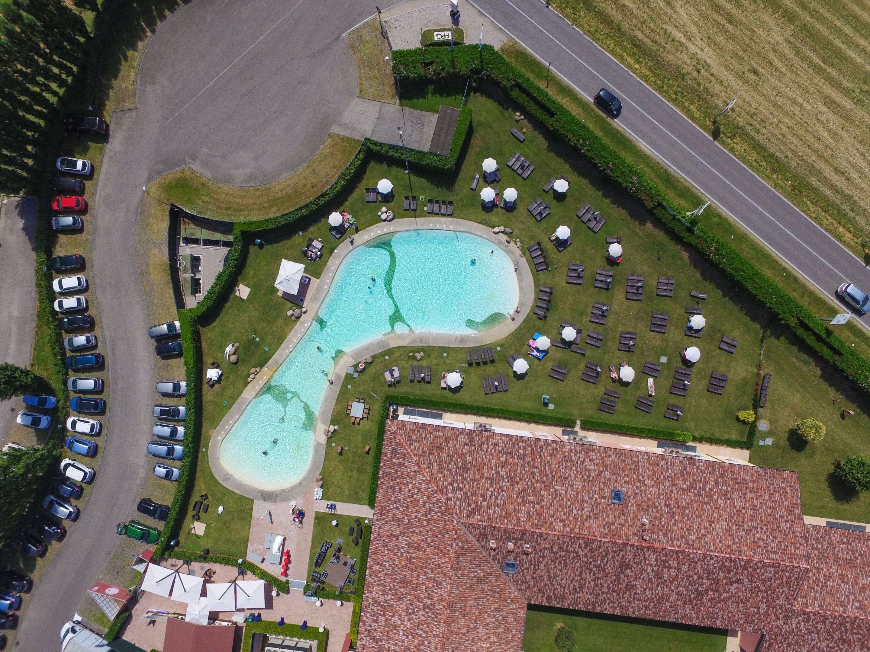 seasonal outdoor pool, pool umbrellas, pool loungers