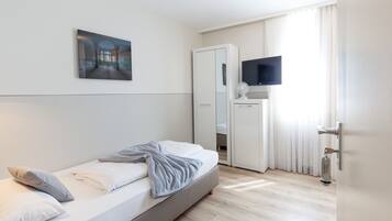 Single Room, 1 Twin Bed | Premium bedding, individually furnished, desk, blackout drapes