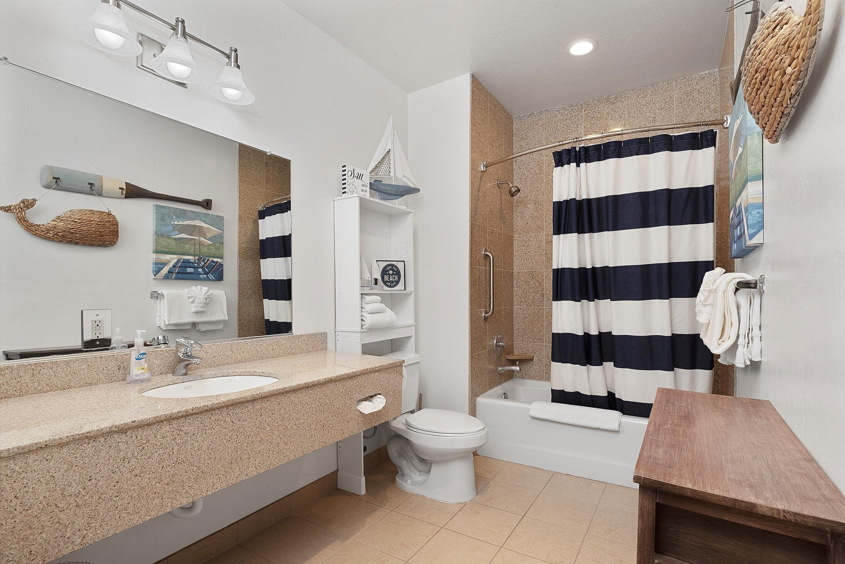 204 - whales inn | bathroom | combined shower/bathtub, designer toiletries, hair dryer, towels