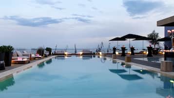 Indoor pool, seasonal outdoor pool, pool umbrellas, sun loungers
