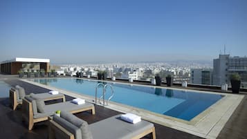 Indoor pool, seasonal outdoor pool, pool umbrellas, pool loungers