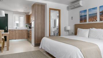 2 chambres, surmatelas, coffres-forts dans les chambres