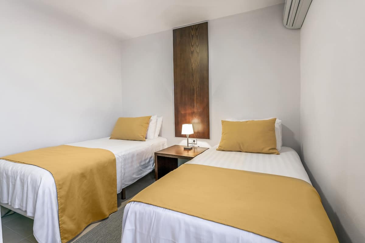 Pillow-top beds, in-room safe, iron/ironing board, free cots/infant beds