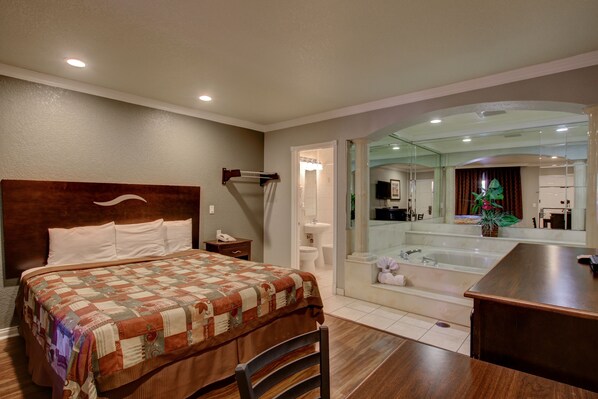 Room, 1 King Bed, Jetted Tub | Living area | LCD TV - West Coast Inn - Near Gem Theatre (Santa Ana)