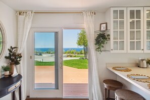 Luxury House | Private kitchen | Mini-fridge, microwave, coffee/tea maker, cleaning supplies