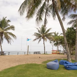 On the beach, white sand, free beach cabanas, sun loungers