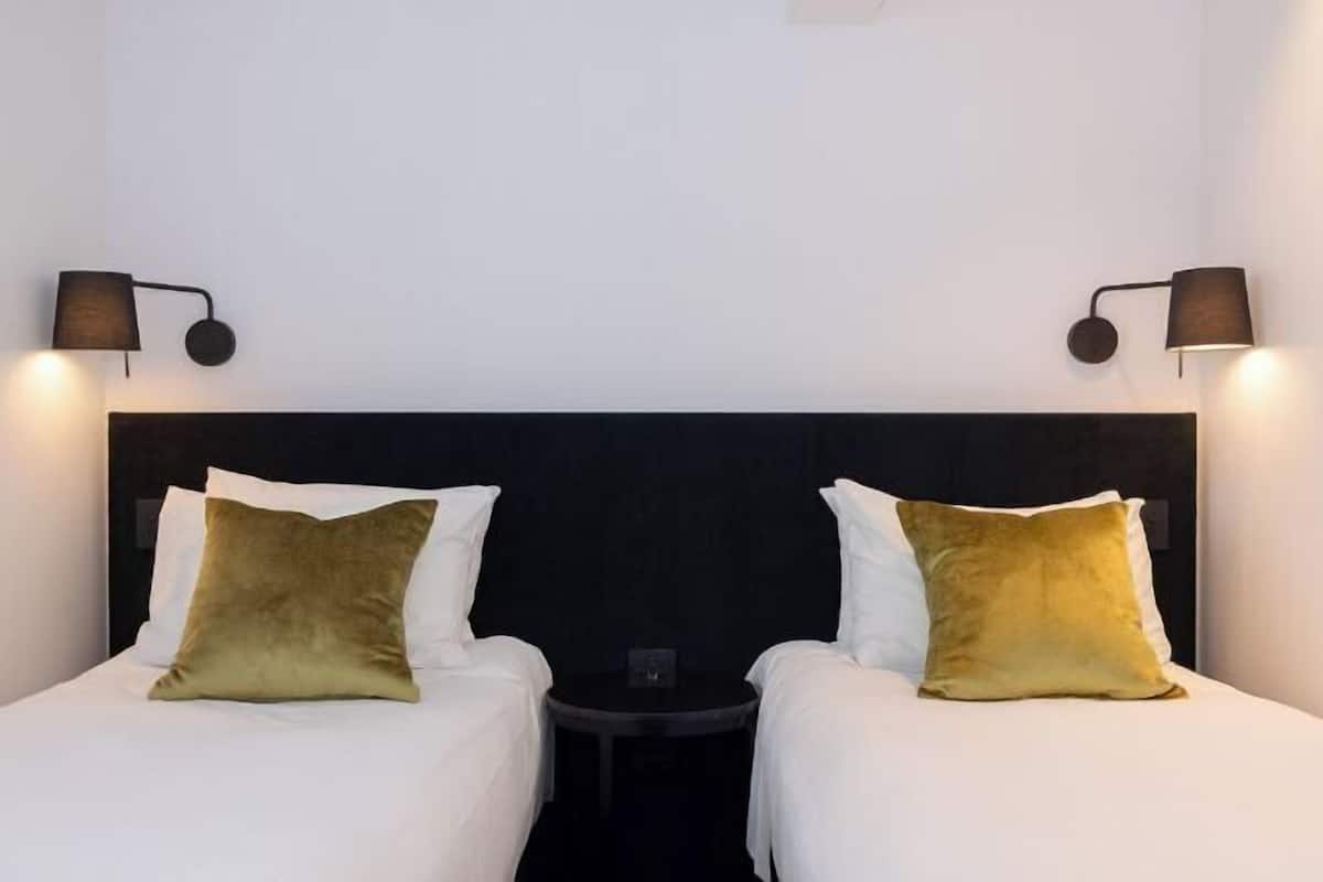 Egyptian cotton sheets, premium bedding, down comforters, minibar