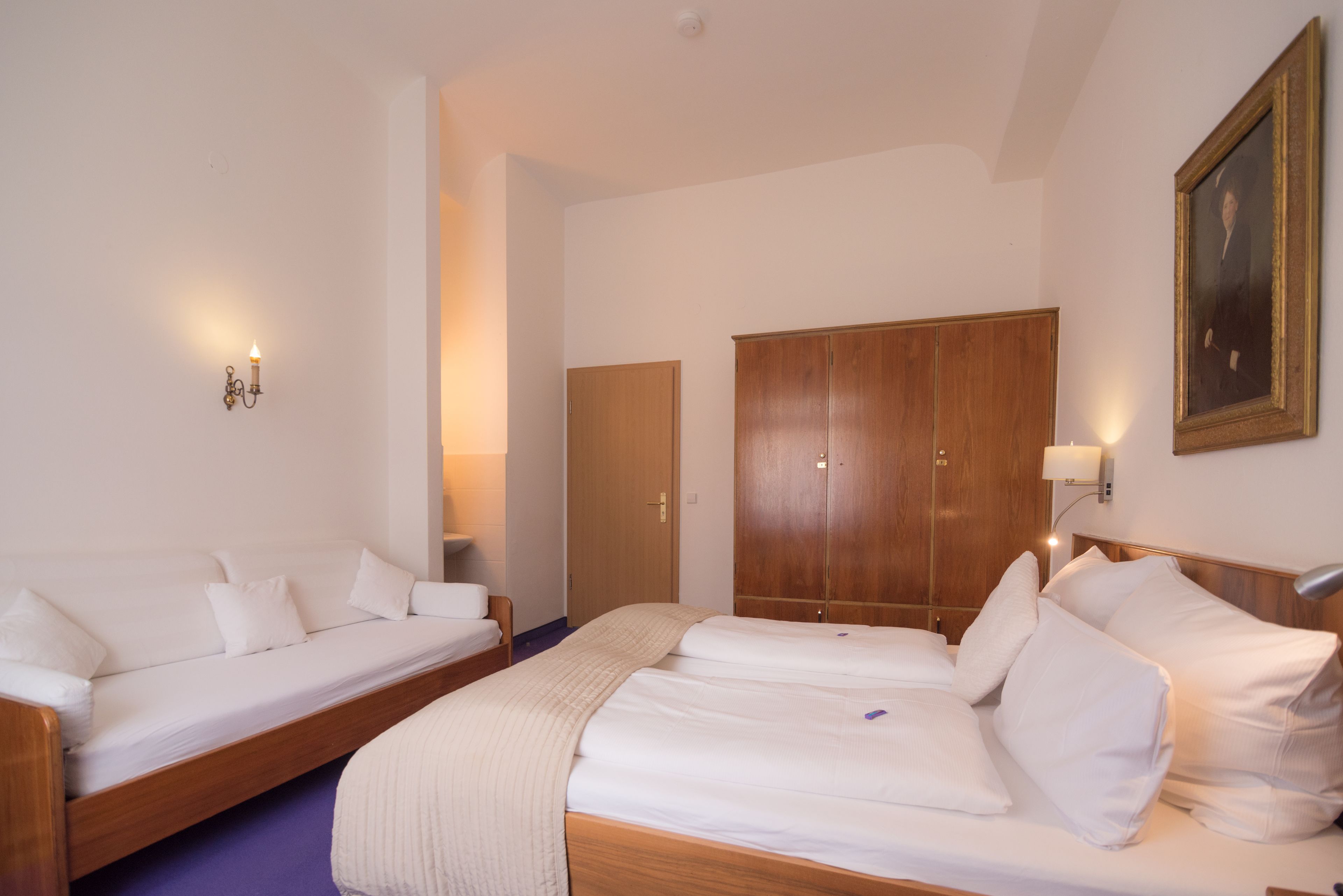 hypo-allergenic bedding, down duvets, minibar, in-room safe