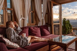 Royal Queen Suite with Outdoor Hot Tub and Fireplace | Living area | LED TV - Hotel Taskonaklar Cappadocia - Special Class (Nevsehir)