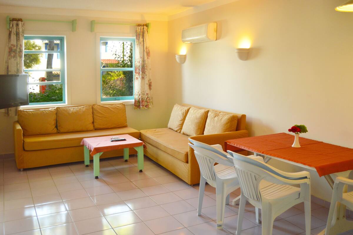 Appartement Familial, 2 chambres, vue jardin, côté jardin