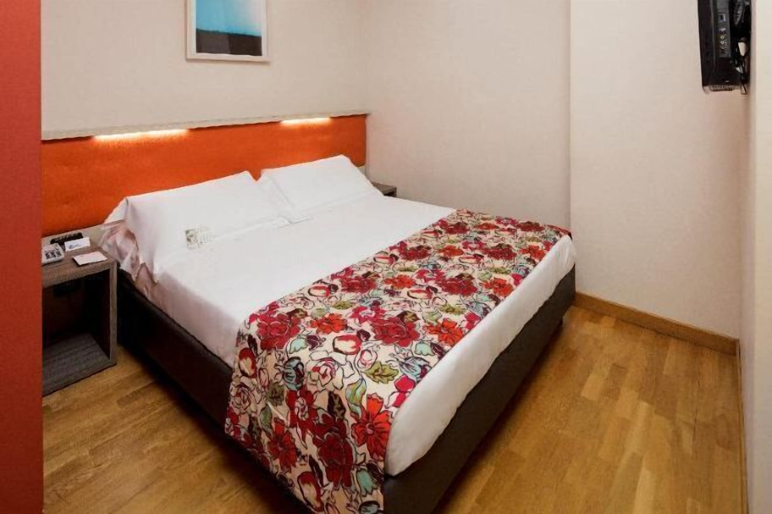 Luxe beddengoed, donsdekens, pillowtop-bedden, een minibar