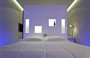 Junior suite | Een minibar, een kluis op de kamer, individueel gedecoreerd