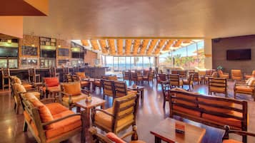 Cocktail bar, poolside views, open selected days