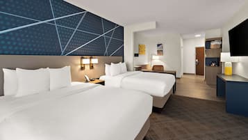 Premium bedding, pillow-top beds, desk, laptop workspace