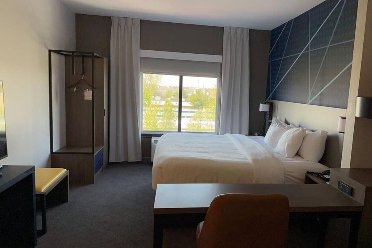 Premium bedding, pillowtop beds, desk, laptop workspace