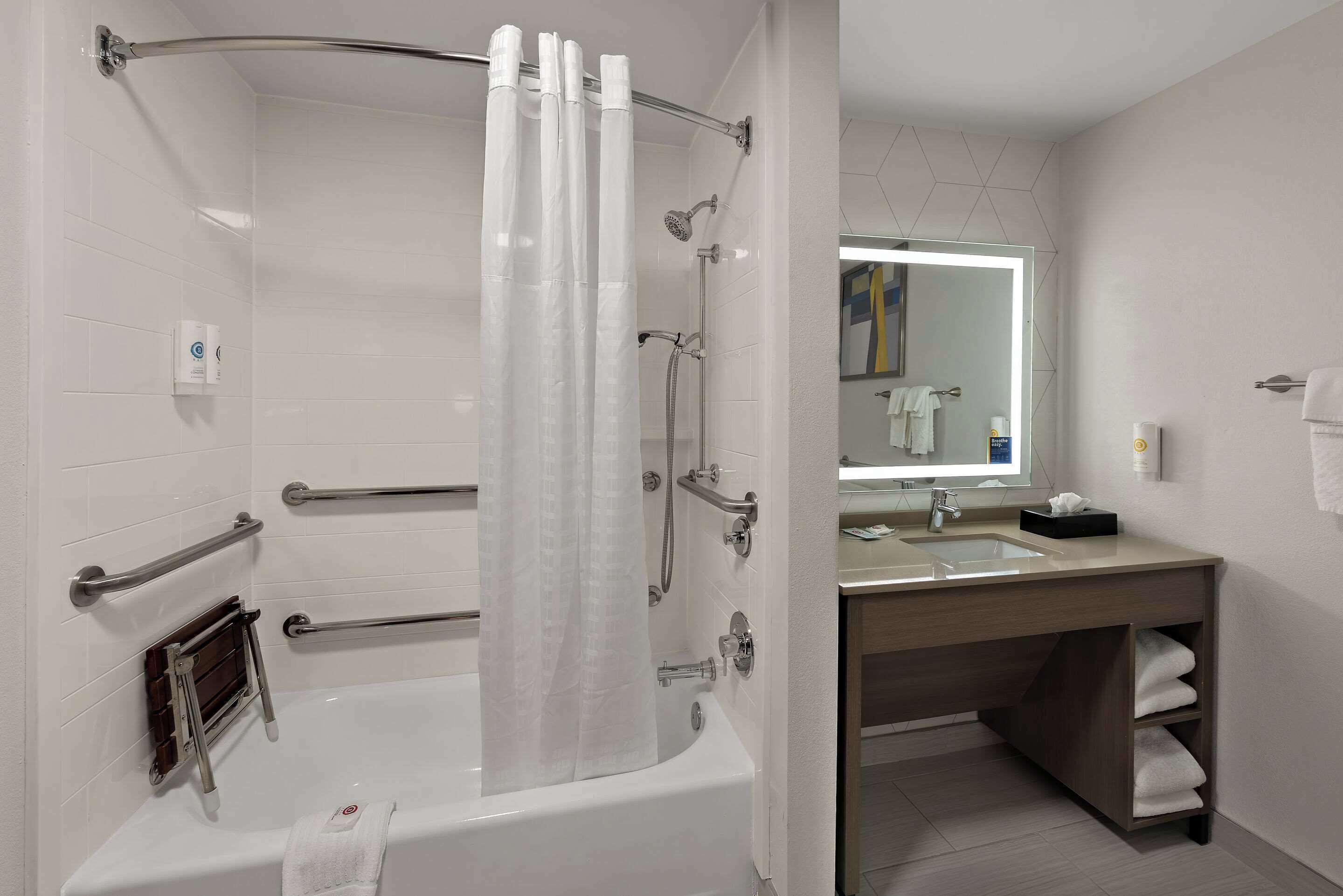 premium bedding, pillow-top beds, desk, laptop workspace