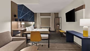 Premium bedding, pillow-top beds, desk, laptop workspace