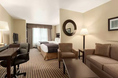 Desk, laptop workspace, blackout drapes, iron/ironing board. University Hotel - Davis Area by IHG