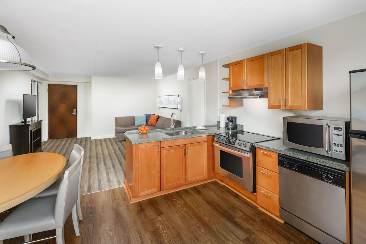 fridge, microwave, coffee/tea maker, cookware/dishes/utensils