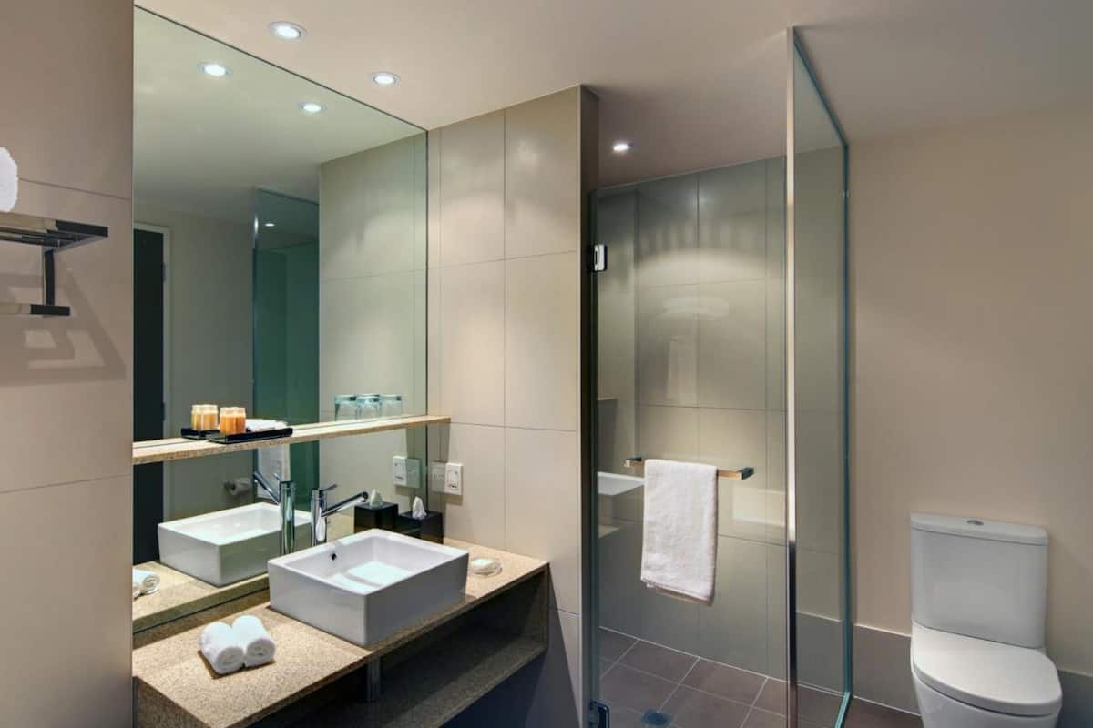 eco-friendly toiletries, hair dryer, bathrobes, slippers