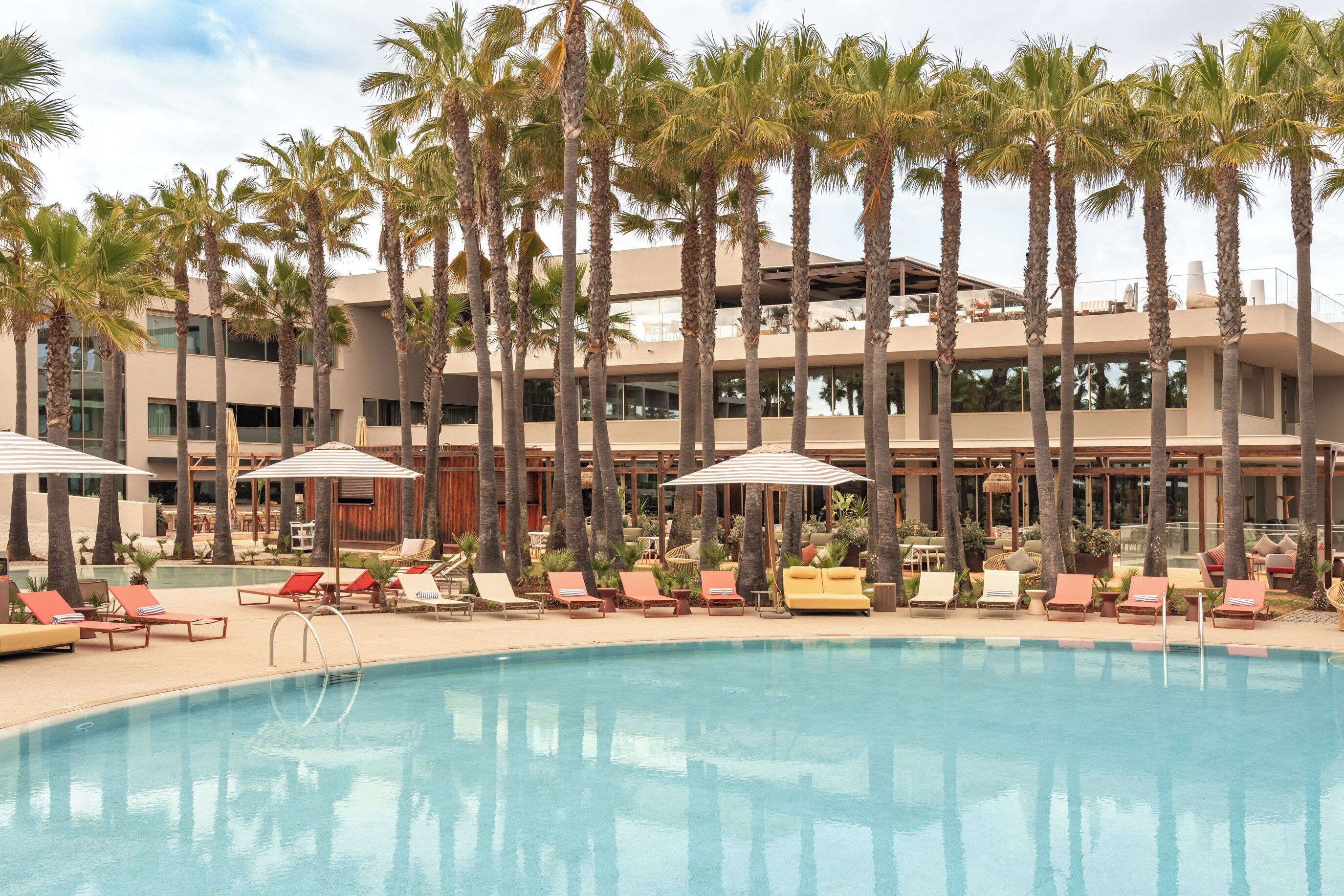 indoor pool, 3 outdoor pools, open 10:00 am to 6:30 pm, pool umbrellas