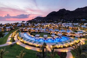 A resort with multiple swimming pools, guest villas, and a mountainous backdrop. - Buccament BAY ALL Inclusive (Kingstown)