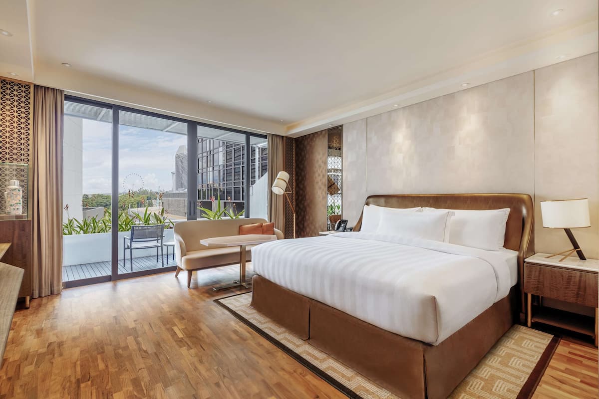 parkroyal club premier room | down duvets, in-room safe, iron/ironing board, free wifi